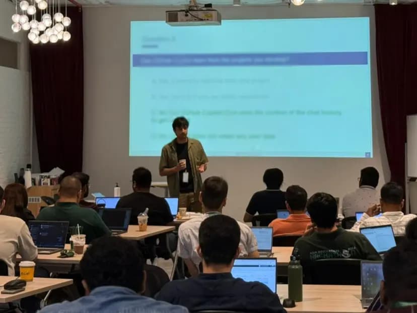 Alejandro speaking at a tech conference